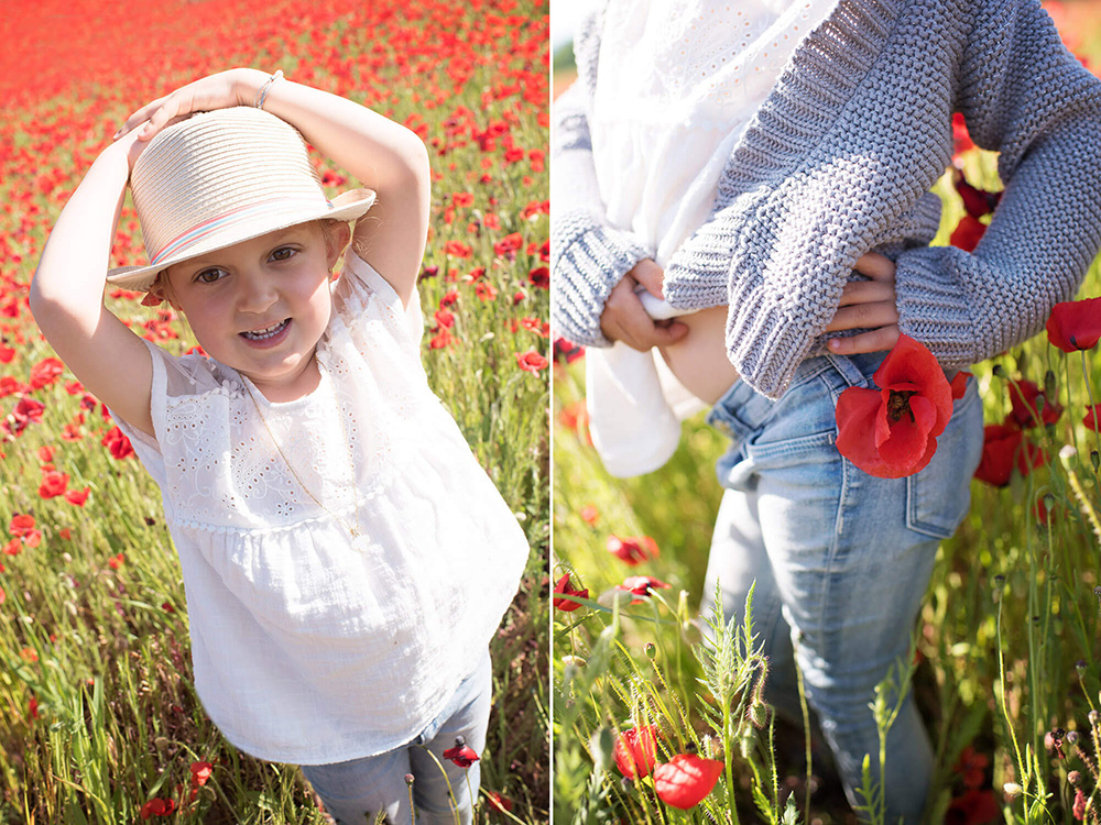 Coquelicot attaché à la ceinture. Portrait d'enfant avec un chapeau de paille.