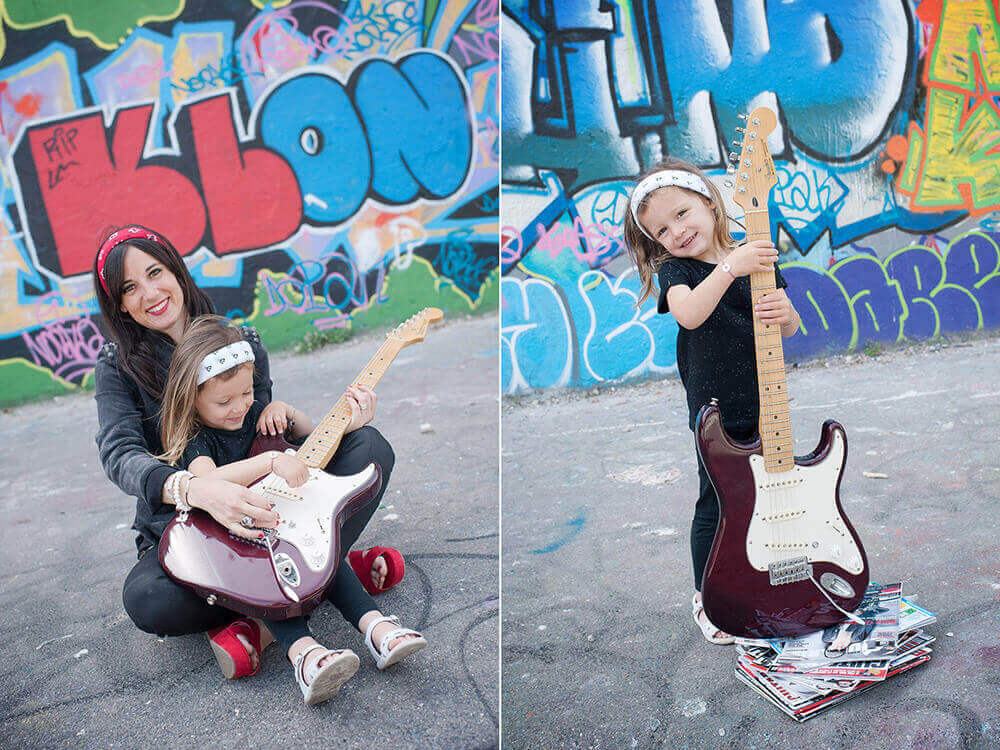 Portrait enfant pas plus haute qu'une guitare électrique.